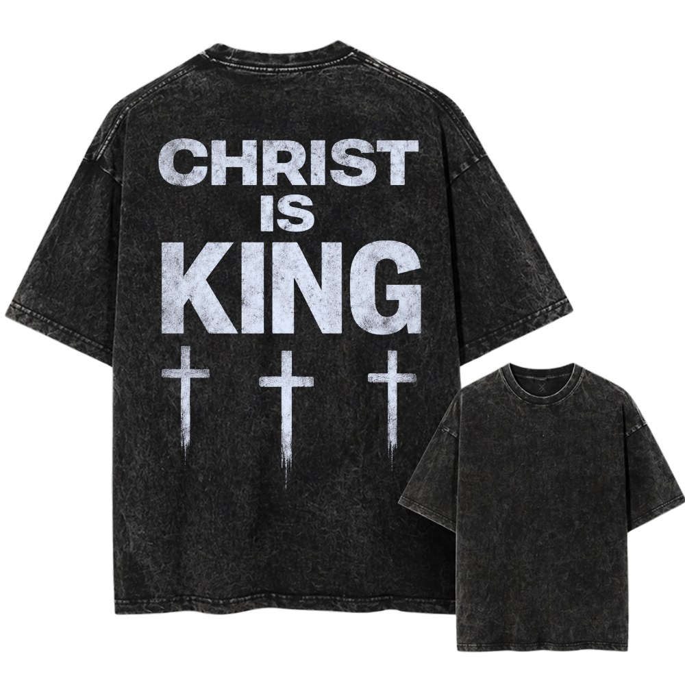 Black t-shirt with 'Christ is King' text and cross symbols on a white background