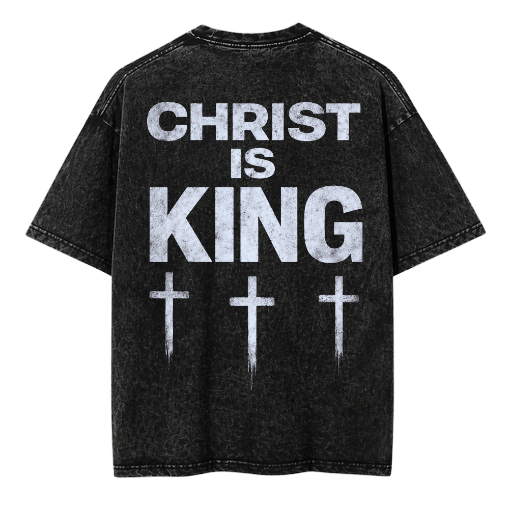 Black t-shirt with 'Christ is King' text and cross symbols on a white background