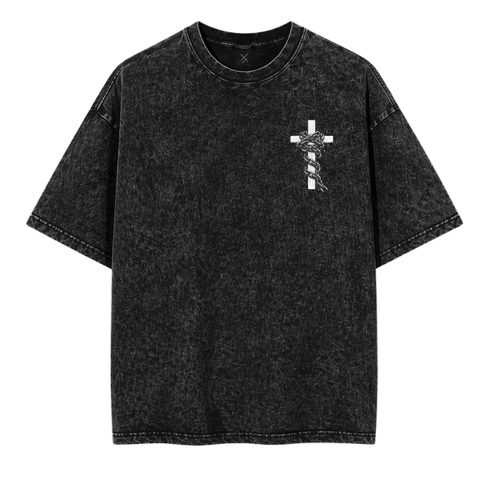 Black t-shirt with a white cross design on a white background